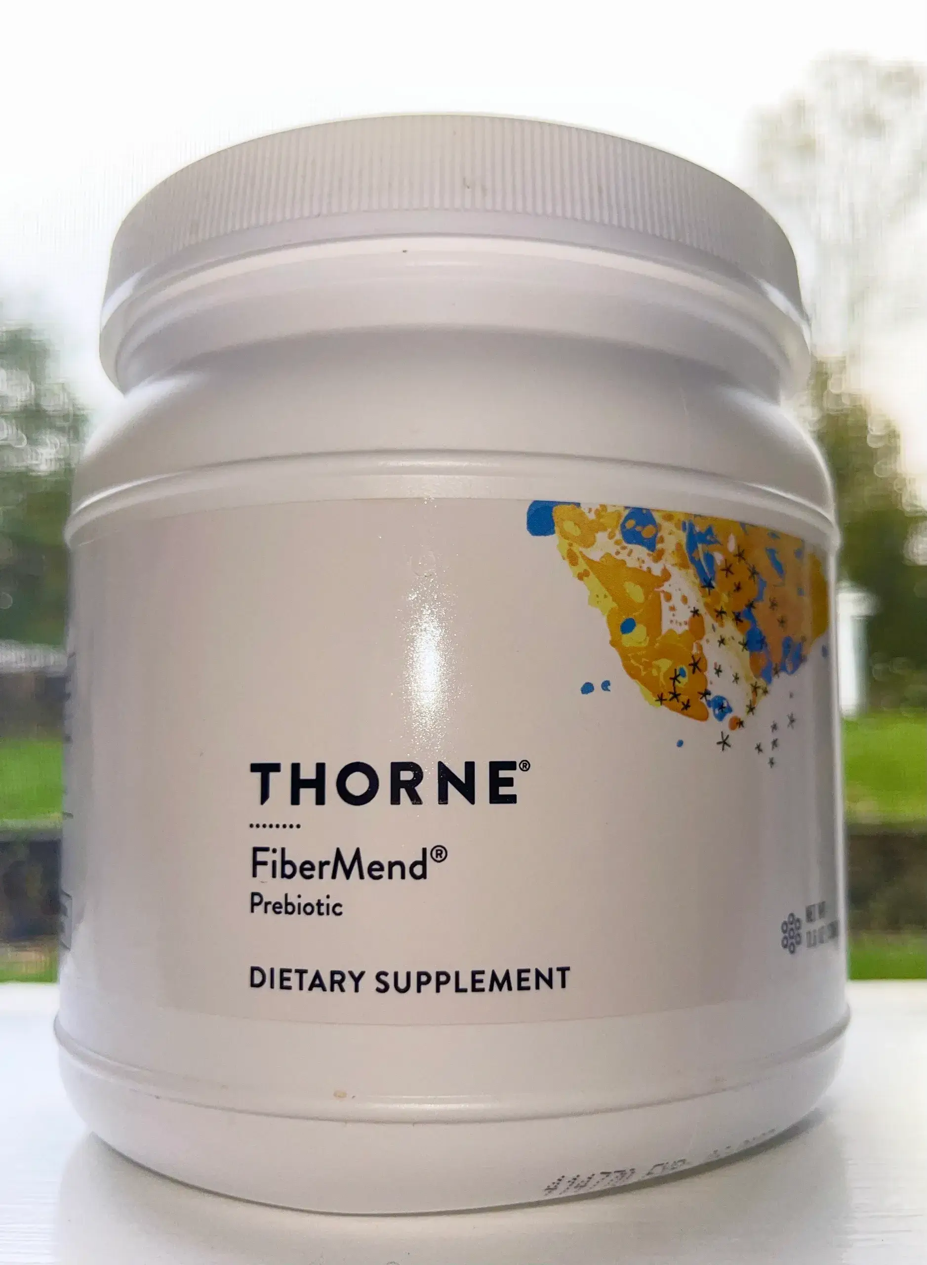 Thorne FiberMend Prebiotic dietary supplement container.