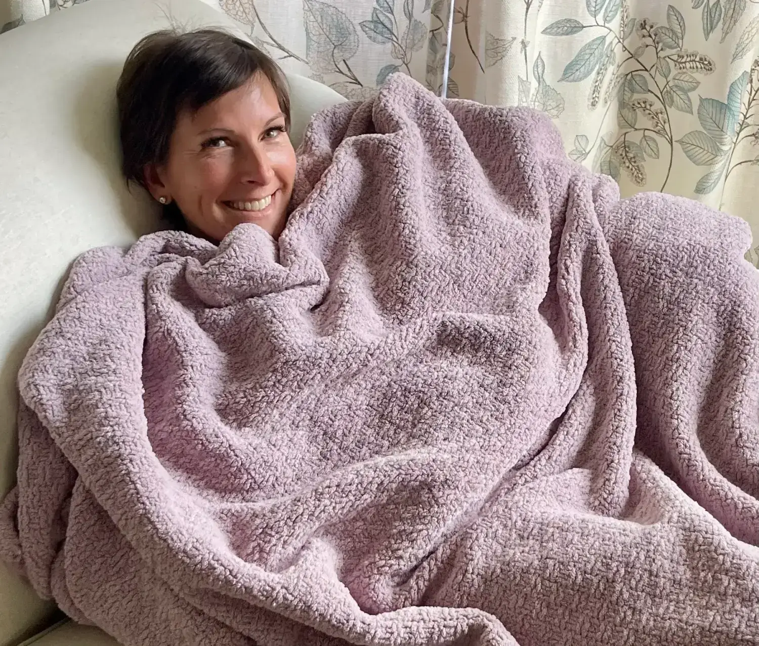 Using a weighted blankaet as part of my curated midlife wellness tool kit to support better sleep and calm.