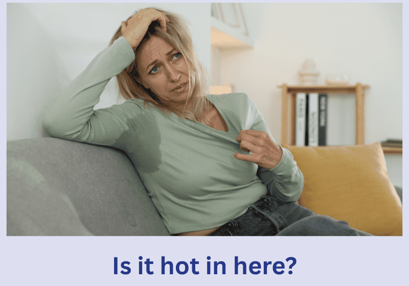 Midlife woman experiencing hot flashes during perimenopause and menopause — blog on causes, symptoms, and relief strategies.