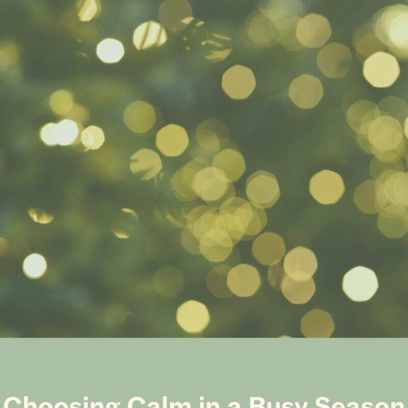 Soft green and gold bokeh holiday lights with the text “Choosing Calm in a Busy Season,” representing finding peace during the holidays.