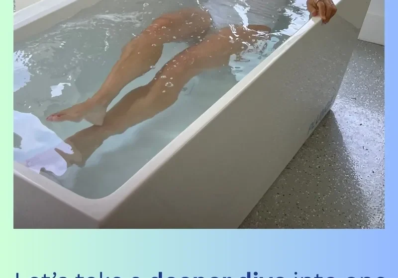 Person relaxing in a bathtub filled with water for wellness.