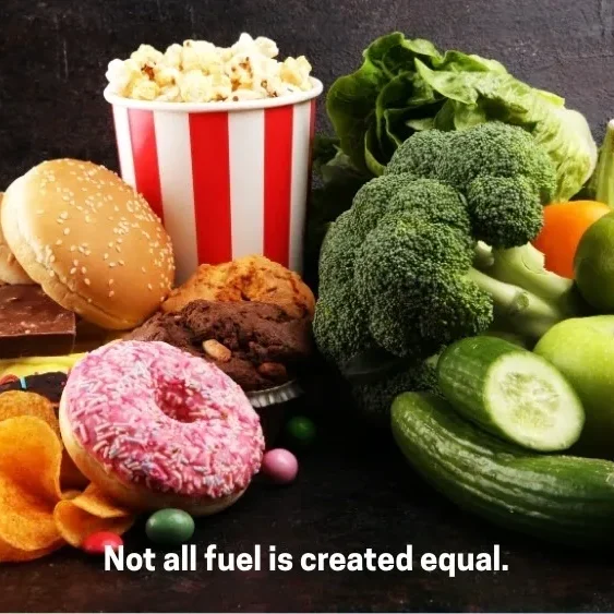 Healthy vegetables and junk food side by side with caption 'Not all fuel is created equal.'